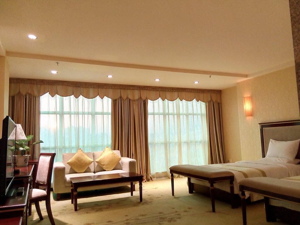 Guangzhou Li Gang Hotel Cantão Quarto foto