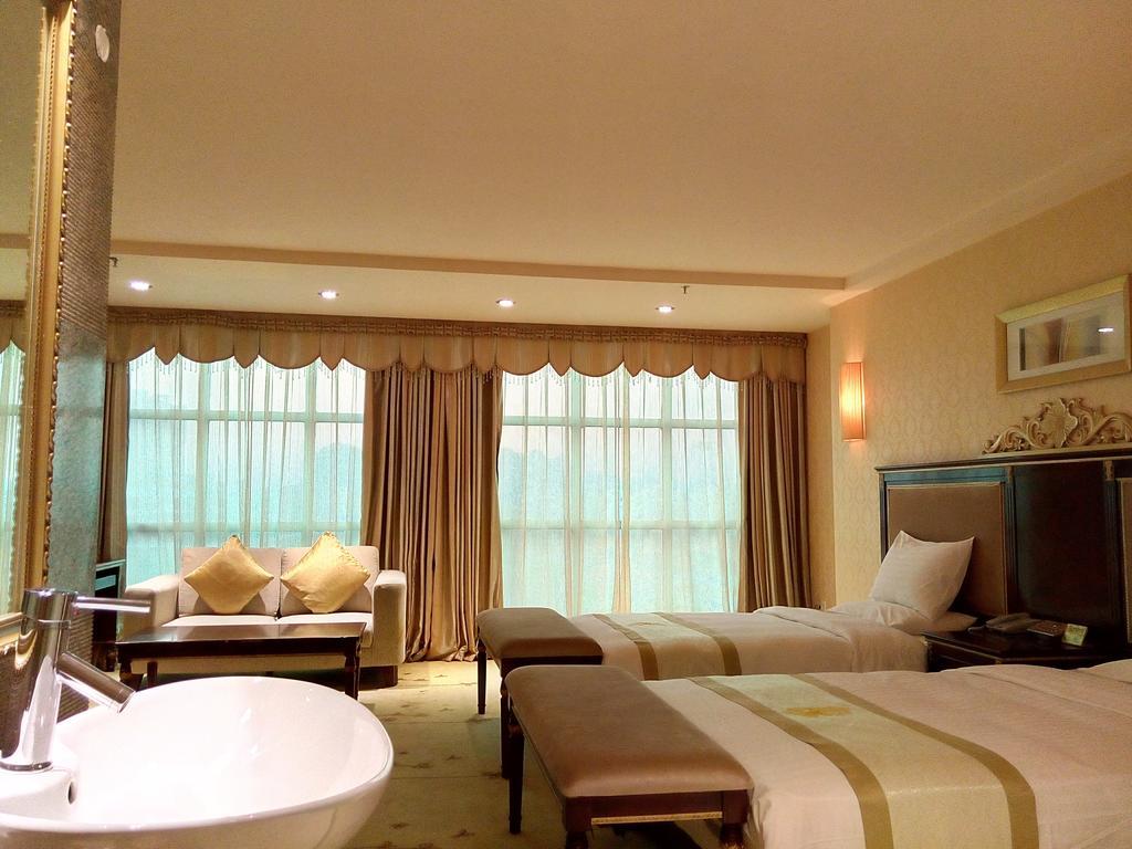 Guangzhou Li Gang Hotel Cantão Quarto foto