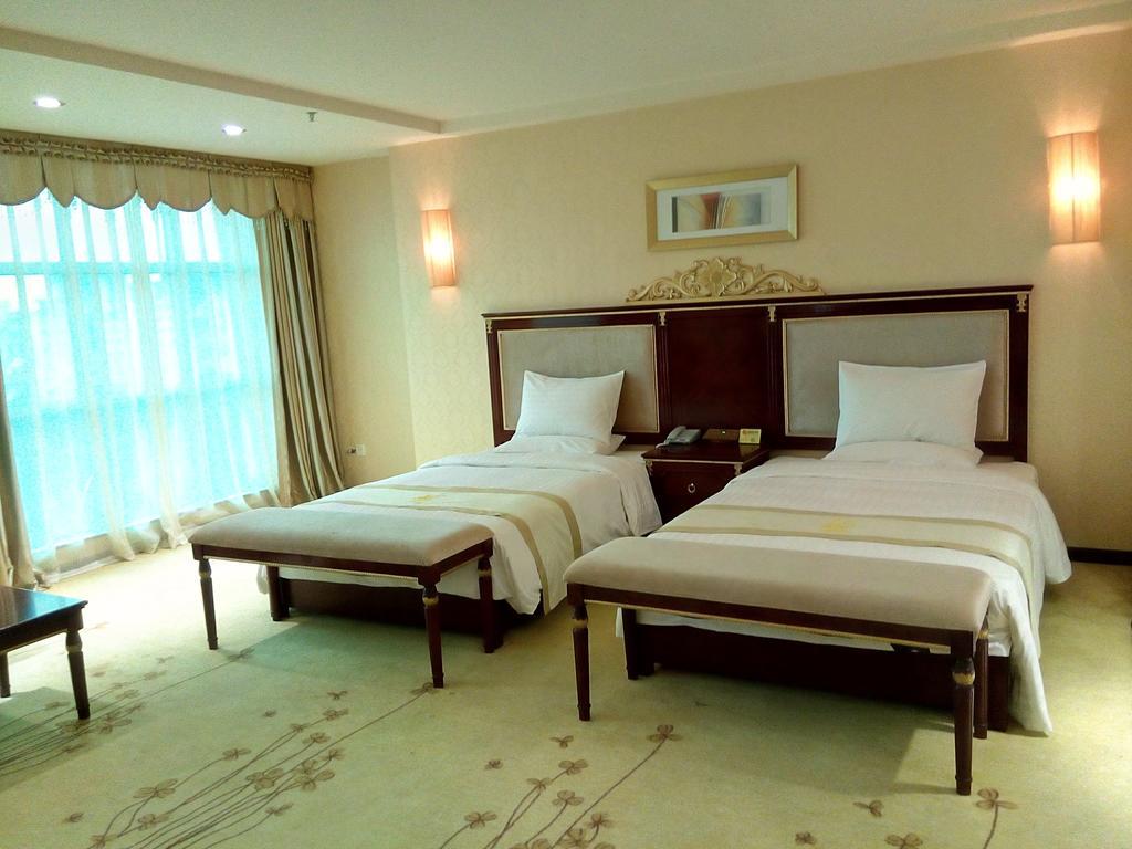 Guangzhou Li Gang Hotel Cantão Quarto foto
