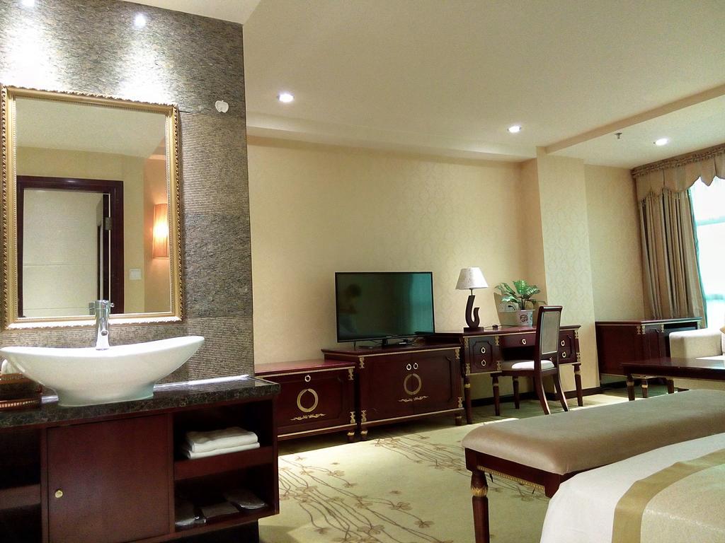 Guangzhou Li Gang Hotel Cantão Quarto foto