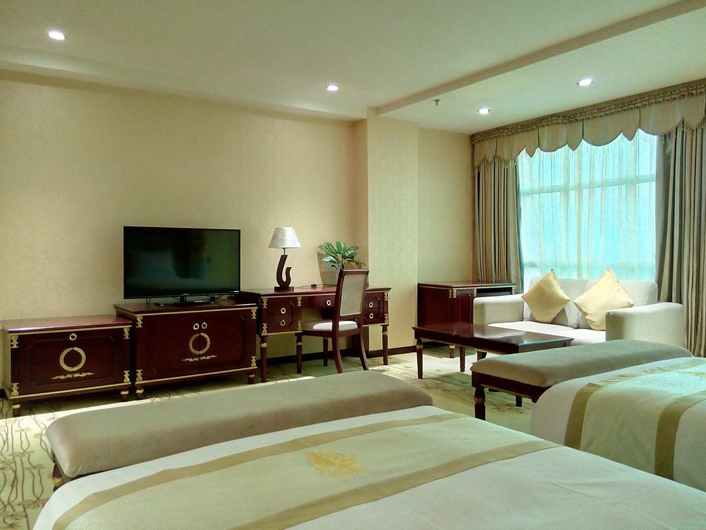 Guangzhou Li Gang Hotel Cantão Quarto foto