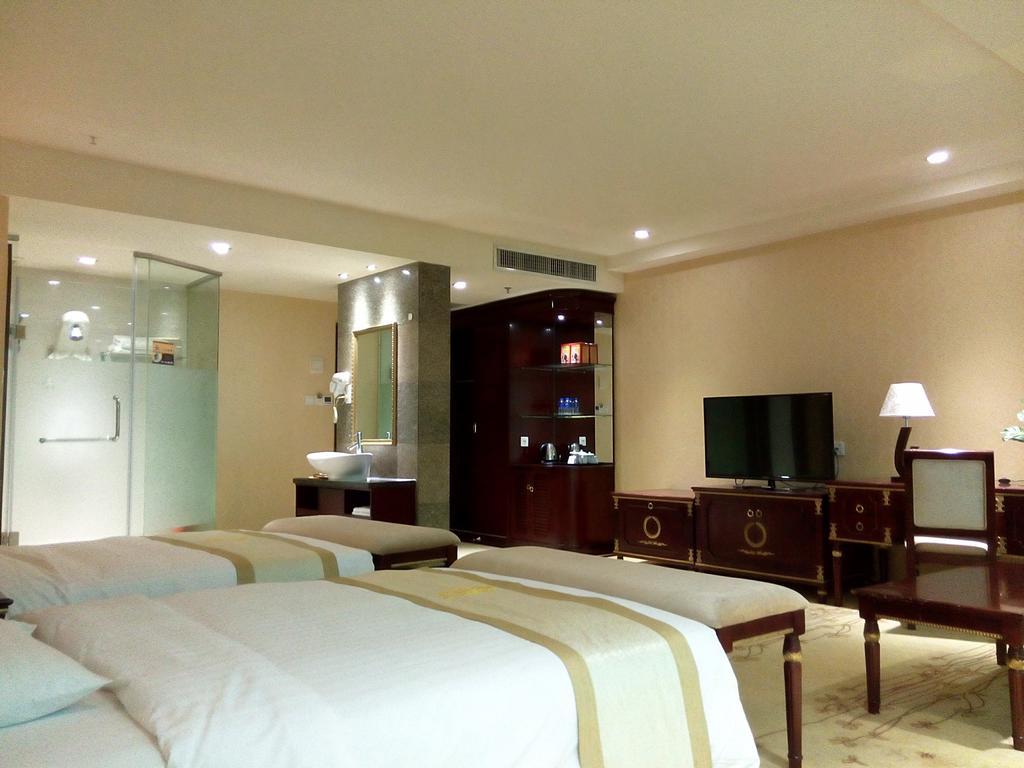 Guangzhou Li Gang Hotel Cantão Quarto foto