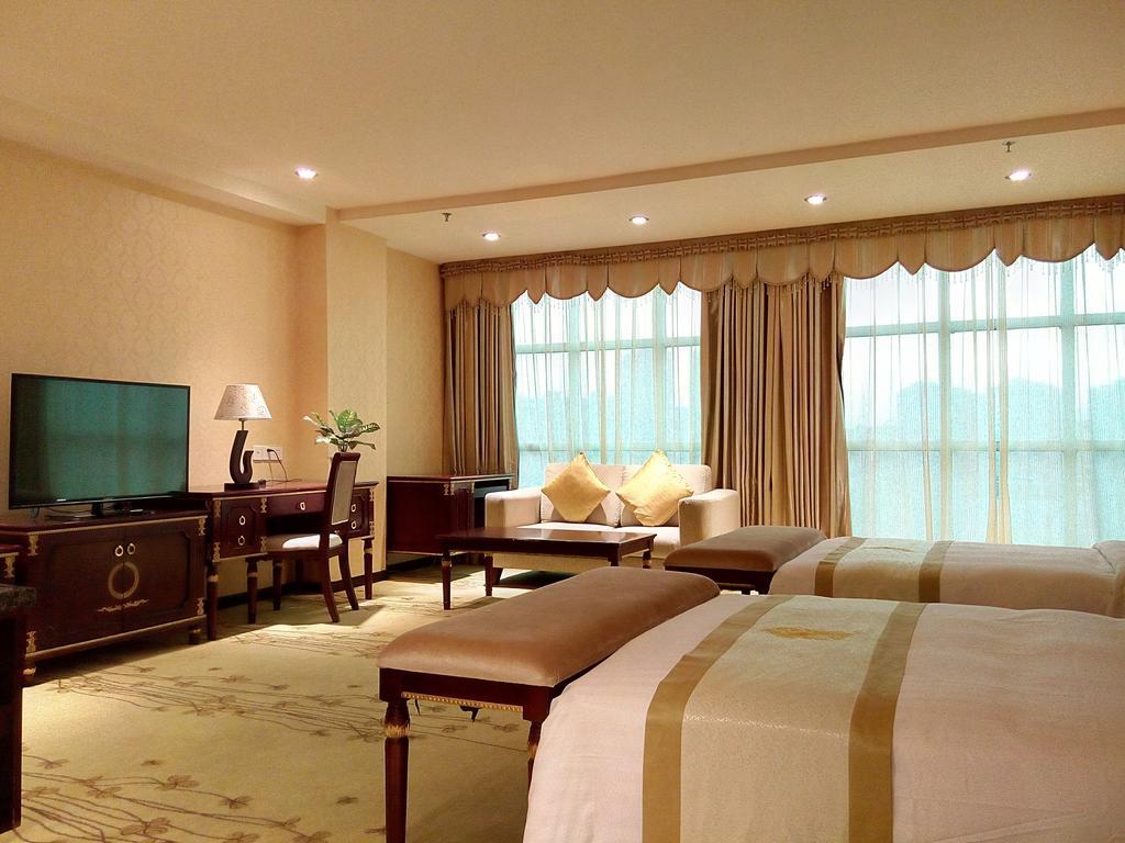 Guangzhou Li Gang Hotel Cantão Quarto foto