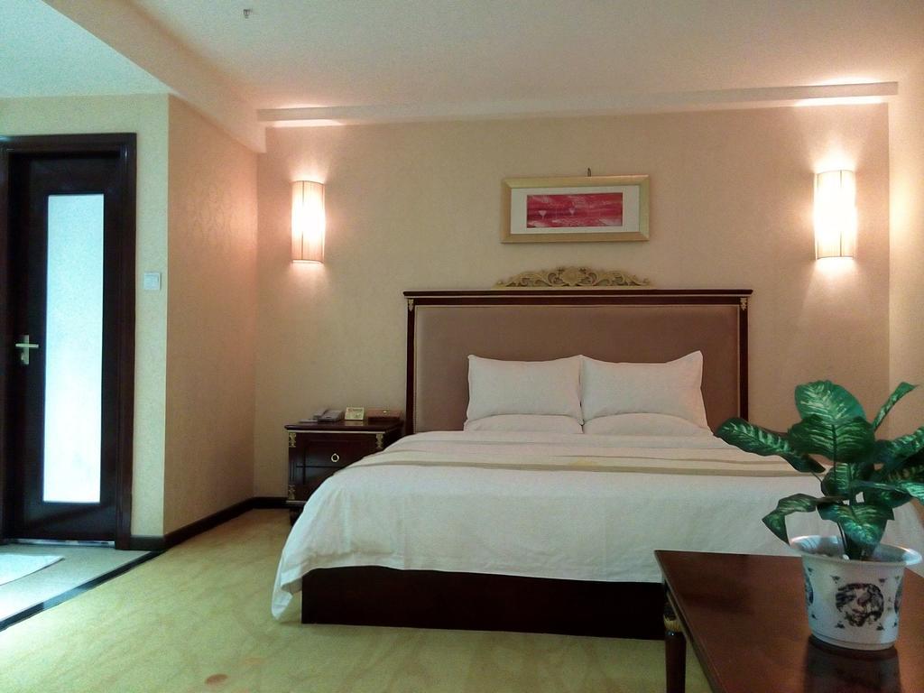 Guangzhou Li Gang Hotel Cantão Quarto foto