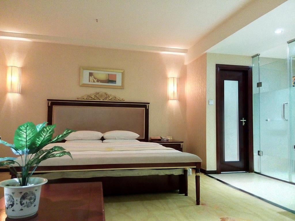 Guangzhou Li Gang Hotel Cantão Quarto foto